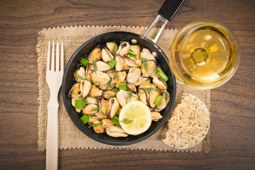 Mussels in a simple rustic table.