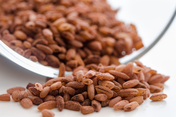 Pile of the uncooked raw brown rice
