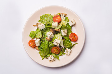 Healthy Salad with mushrooms, tomatoes and cheese