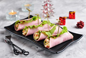 Traditional Russian Christmas salad of boiled potatoes, carrots, eggs, pickled cucumbers, canned...