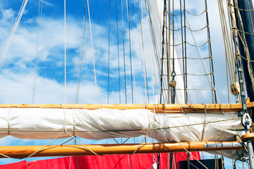 Mast, sails and shroud of a tall ship. Rigging detail.