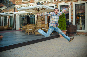 happy man jumping from joy