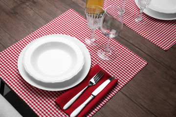 Elegant table appointments with checkered napkin