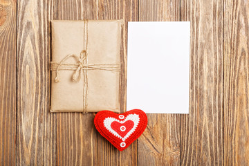 Gift parcel, white blank label and red heart