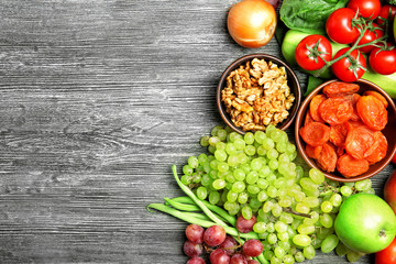 Fruits and vegetables on wooden background