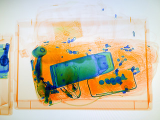 Scanned baggage on the x-ray scanner screen in the airport