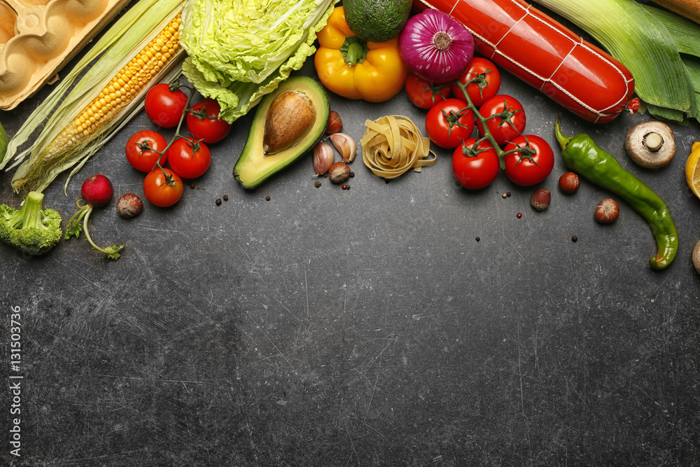 Canvas Prints Variety of food products on grey background