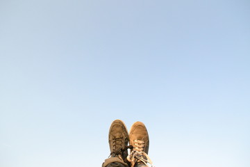 Pair of shoes with a blue sky background