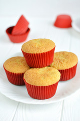 Homemade cupcakes in a white plate on white background