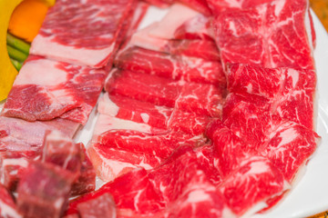 Uncooked raw fresh beef .