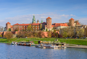 Fototapeta na wymiar The view of Wawel castle located on bank of Vistula river in Krakow city, Poland.