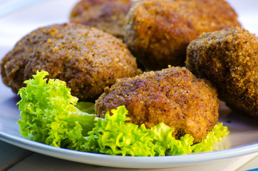 fried meatballs on a plate