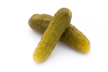 Marinated pickled cucumbers isolated on the white.