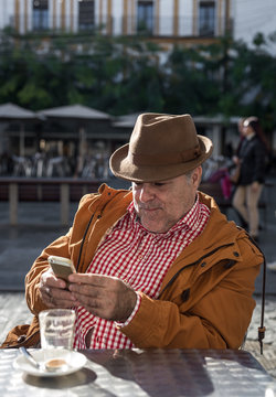 50 Year Old Man Taking Selfie