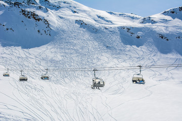 Fototapeta na wymiar Ski slope and cable car on the ski resort in Austria, Alps. 