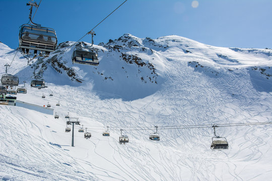 Ski slope and cable car on the ski resort  in Austria, Alps. 