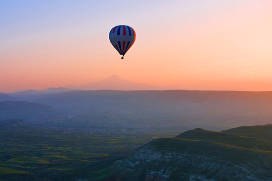 Hot air balloon flying in Cappadocia, Anatolia, Turkey.