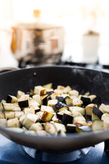 Diced eggplant in pan