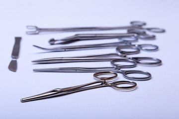 Surgical instruments and tools on table for a surgery