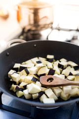 Diced eggplant in pan