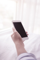 woman hands holding smartphone