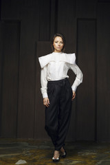 Attractive girl in fashionable clothes