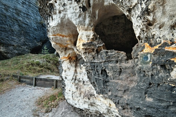 detail of czech tourist area Tiske steny with rock formation in the shape of a human skull in winter without snow