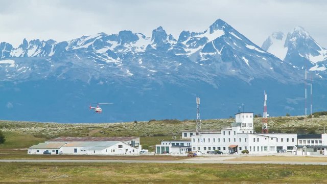 Sightseeing Helicopter Landing in Ushuaia Argentina with Majestic Martial Mountain Background on a Sunny Summers Day at the Popular South American Destination