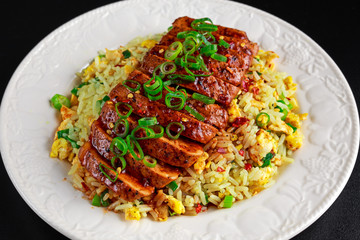 Chinese style Egg fried rice with sliced pork fillet