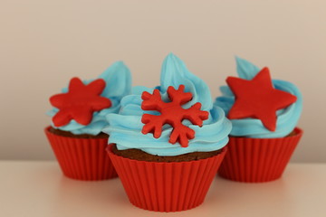 red cupcakes on white background