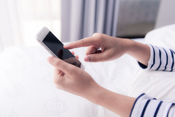 hands holding smartphone