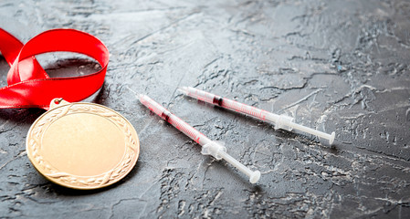 Concept of doping in sport - deprivation medals