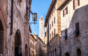 View of street and tower at San Gimignano, Italy