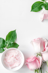 organic cosmetic with rose oil on white background top view