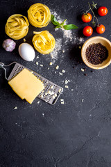 ingredients for cooking paste dark background top view mock up