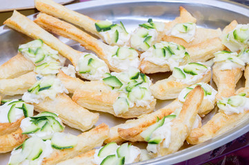 teaspoon of bread with courgette and gorgonzola