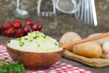 Homemade, delicious mashed potatoes in rustic style kitchen