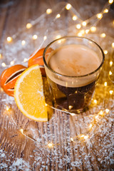 Creamy ginger coffee on the wooden table Christmas