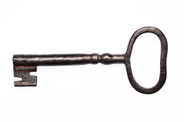 Old rusty big key isolated on white background