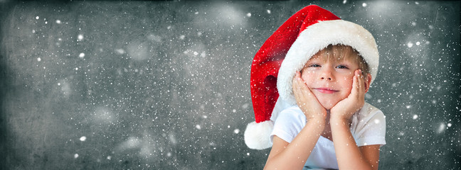 Funny Boy in Christmas Santa Hat Isolated Grey