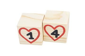 Wooden cubes with handwritten 14th and red hearts. Isolated on a white background.