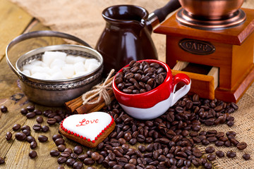 Cup of black tea and heart shaped cookies, for valentine's day