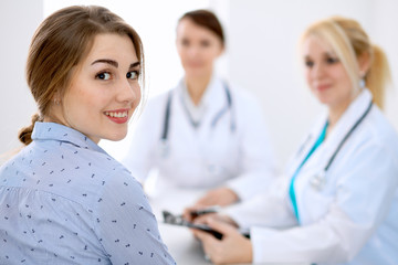 Fototapeta premium Doctor and patient at meeting. Medicine and health care concept.