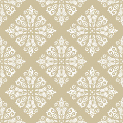 Seamless oriental pattern in the style of baroque. Traditional classic ornament. Golden and white pattern