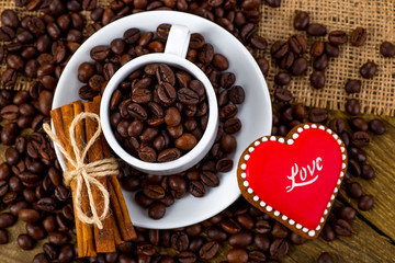 Cup of black tea and heart shaped cookies, for valentine's day