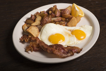 Breakfast - two eggs with bacon and potatoes