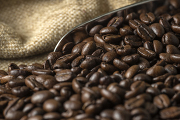 Roasted Coffee Beans Scoop Metal Sack Background.