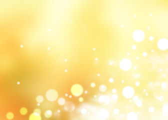 White bokeh on gold background