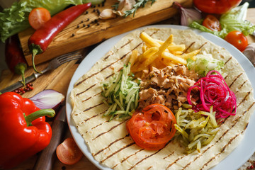 open shawarma with vegetables