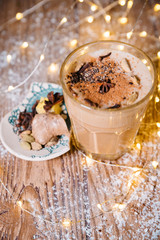ice honey pumpkin spice latte with whipped cream. the toning. selective focus